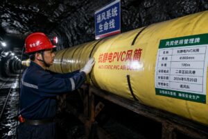 An on-site inspection of anti-static PVC air ducts installed in an underground coal mine ventilation system