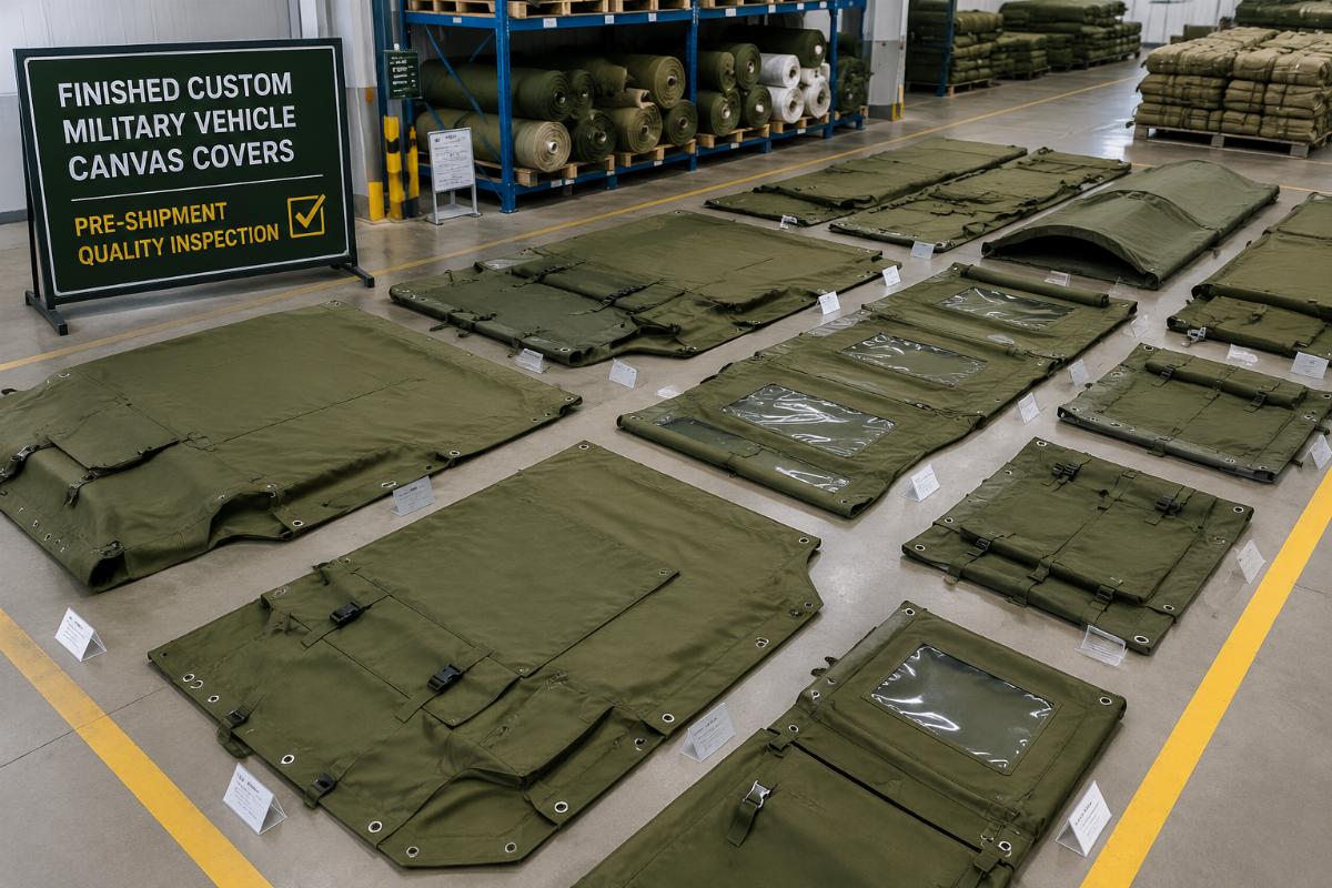 Finished custom military vehicle canvas covers laid out for pre-shipment quality inspection